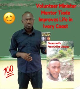 Tiade mentors a young guy picture says volunteer minister improves life in Ivory coast